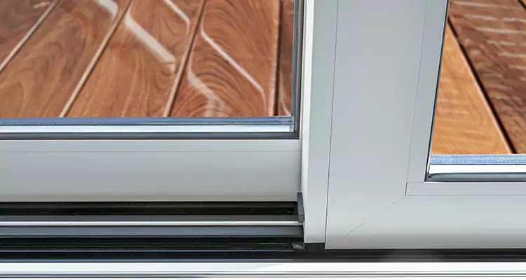 Patio Door Stuck at the Bottom in The Acreage, FL